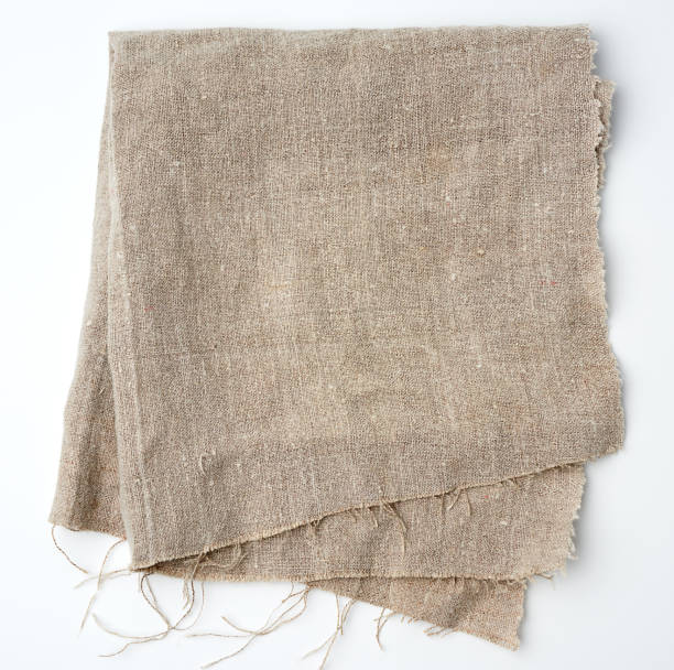 istock crumpled kitchen linen gray towel on white background 1223189548