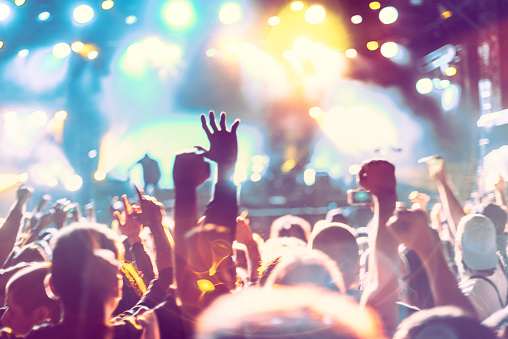 concert, event, audience, festival, entertainment, live, music, nightlife, party, cheer. all audience put hands up in concert event festival entertainment. live music party. let's fun and enjoy