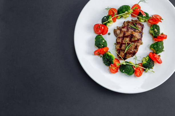 istock grilled meat with tomatoes and broccoli 1223192082