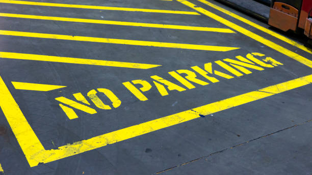 istock A no parking area sign in a warehouse. 1223192224
