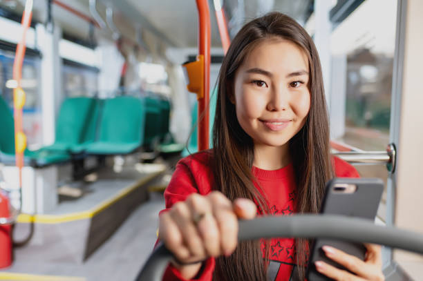 istock asian passenger tramway travel portrait happy student 1223192228
