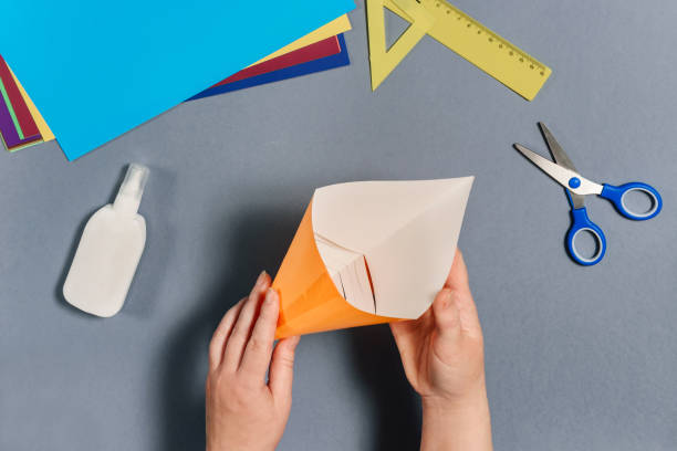 istock We make a fish out of colored paper. Step 6. 1223195565