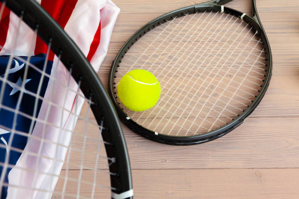 istock Tennis equipment on wooden surface close up 1223198736