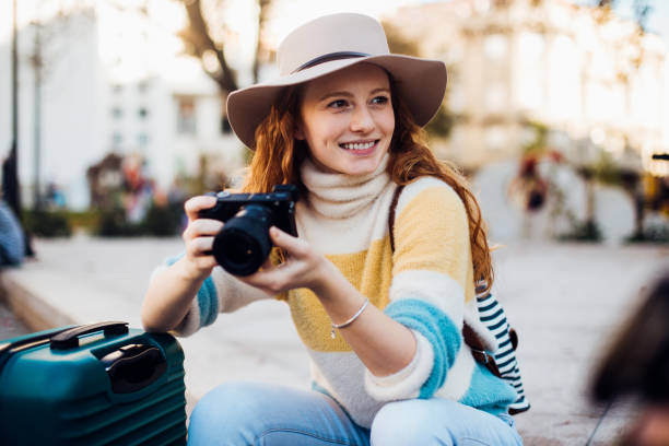 istock Beautiful girl on a journey taking photos 1223198788