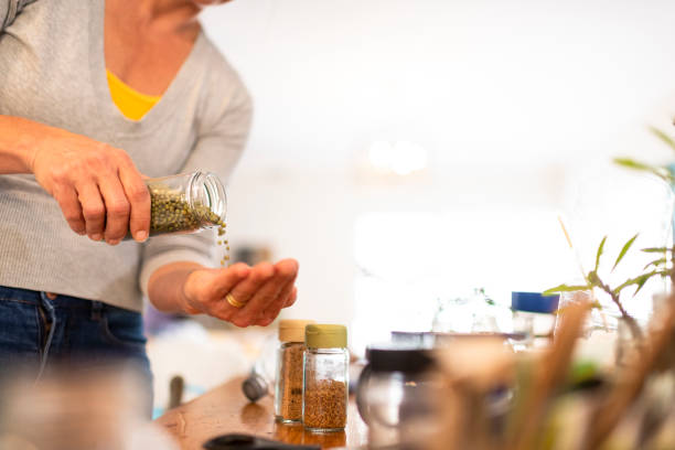 istock Woman pours Mung beans into hand 1223201627