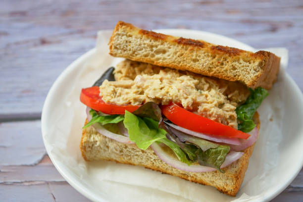 Homemade Tuna Sandwich with Tomatoes and Lettuce stock photo