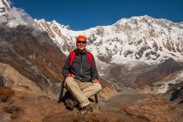 istock Woman sits resting in mountains 1223203510