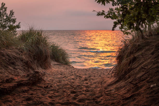 Sunset on Lake Michigan shot from the dunes of Saugatuck Michigan stock photo