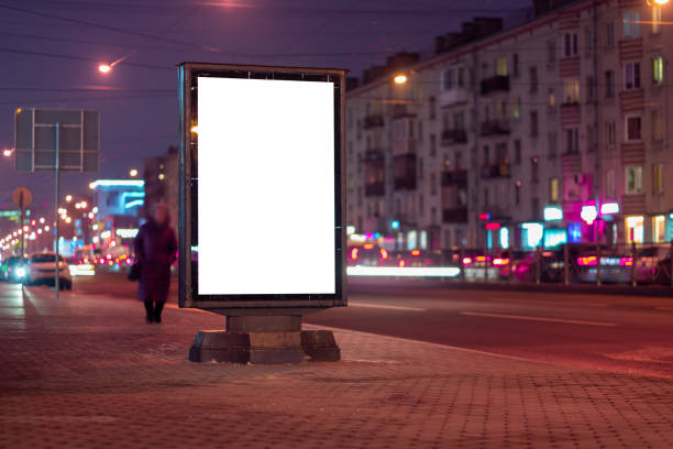 istock Advertising billboard vertical in the city at night glows 1223208359