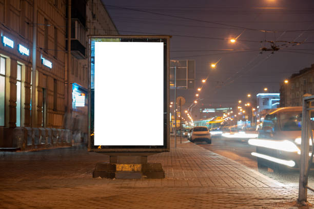 istock Advertising billboard vertical lightbox in the city glows at night 1223208364