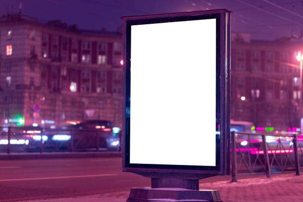 istock Advertising billboard vertical lightbox in the city glows at night 1223208368
