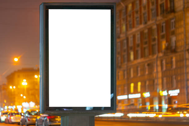 istock Billboard near work at night with burning lanterns. 1223208380