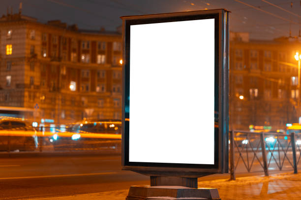 istock Billboard near work at night with burning lanterns. 1223208415
