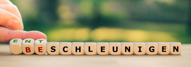 istock Hand turns dice and changes the German word 
