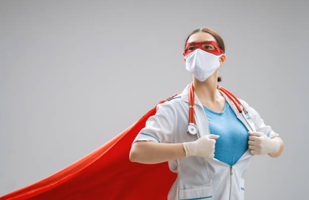 istock Doctor wearing facemask and superhero cape 1223208981