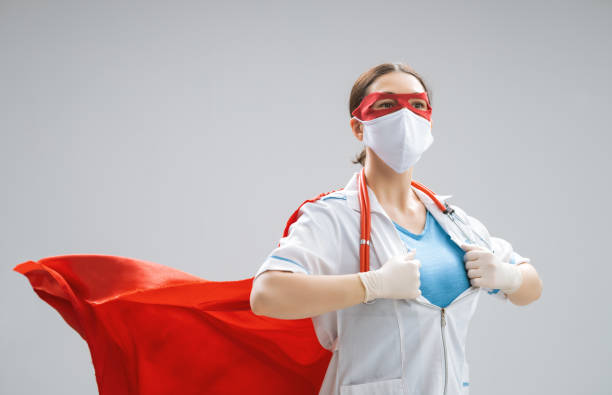 istock Doctor wearing facemask and superhero cape 1223208997