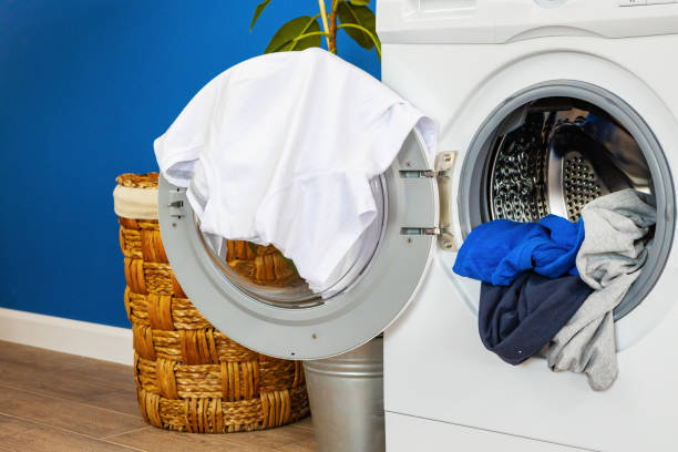 istock Laundry room. Close up of washing machine 1223210114