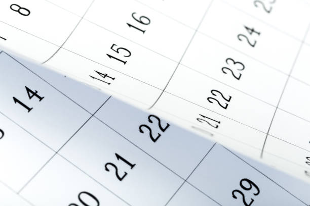 istock Closes a calendar page in blue. flipping calendar 1223210779