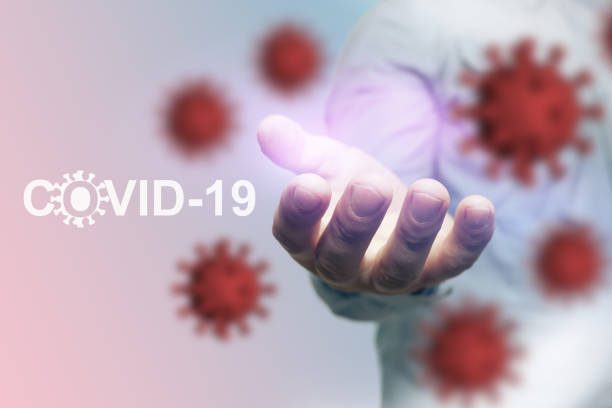 istock Covid-19 outbreak or new Coronavirus, 2019-nCoV, virus on a  beautiful abstract background and dangerous Coronavirus open palm hand gesture of male hand . Covid 19-NCP virus: contagion and propagation of disease. Pandemic and viral epidemic. 1223212113