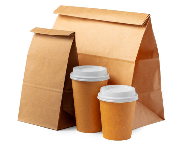 istock Craft paper bag and coffee to go cups on white background 1223213856