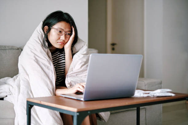 istock A sick woman working at home 1223213898