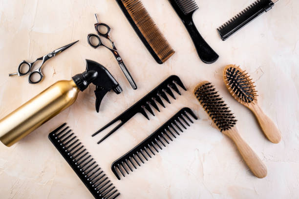 istock Hairdresser tools. Flat lay on beige background top view 1223215348