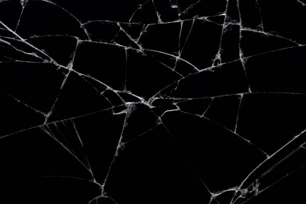 istock Broken black glass, with white lines on black glass. 1223217677