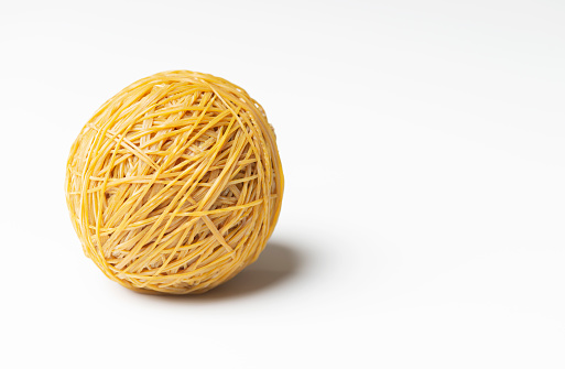 Rubber band ball on white.