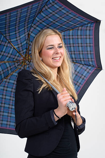 istock Young woman with umbrella. 122322230