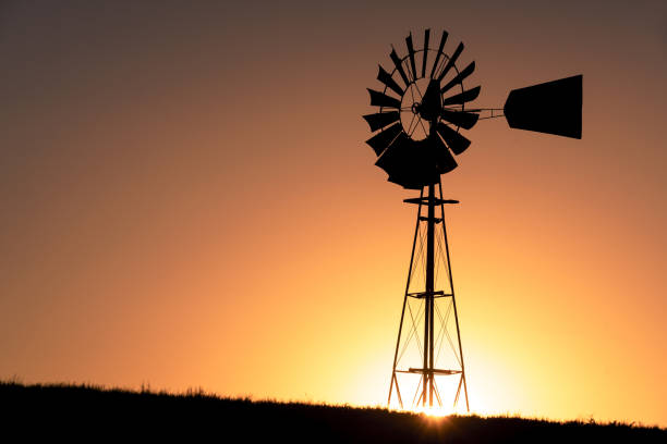 istock Silhouette of a windmill 1223223379