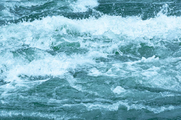 istock rough ocean waves, stormy sea surf, fast flowing mountain river 1223224821
