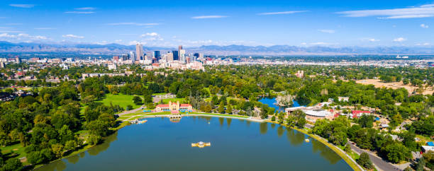 Wide Panoramic view of Denver , Colorado aerial drone views Wide Panoramic view of Denver , Colorado  with Rocky Mountains in the background and green summer landscape above City Park denver stock pictures, royalty-free photos & images
