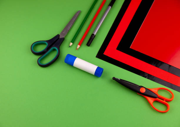 istock Step 1. Step by step instructions. How to make a red poppy from colored paper. Creative crafts for Victory Day. Memorial Day of the victims of the war in Ukraine. Paper flower. Do it yourself. DIY 1223226364