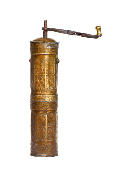 istock Oriental vintage coffee grinder isolated on white 1223226483