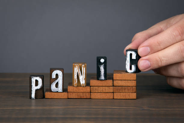 istock PANIC concept. Wooden alphabet letters on steps 1223226621
