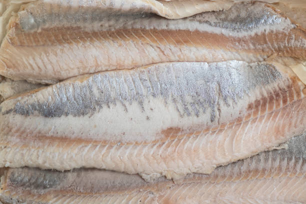 istock Close-up sliced herring fillet as background 1223226856