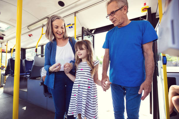istock Girl commuting with grandparents in bus 1223227619