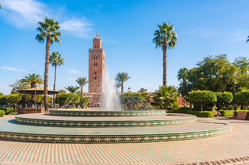Fountain at Lalla Hasna parc with Koutoubia Mosque in the background in Marrakesh, Marrakesh-Safi, Morocco