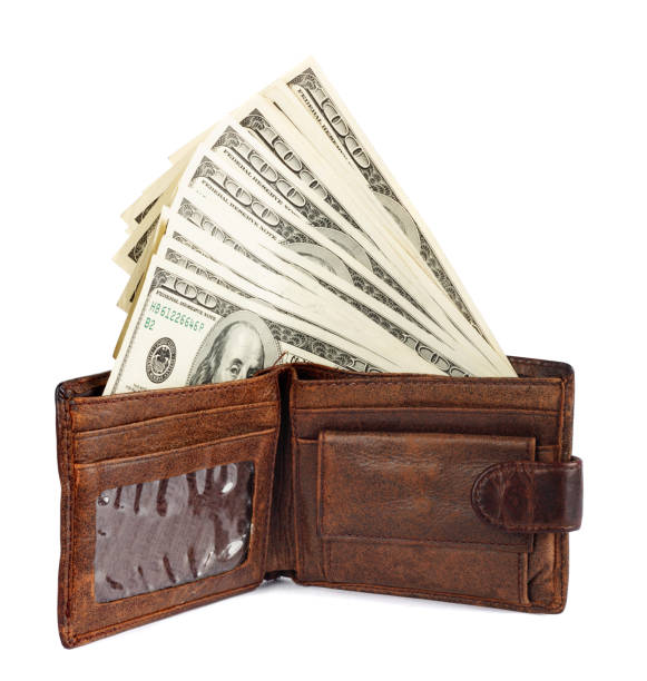 istock money and portmane on the isolated background 1223229459