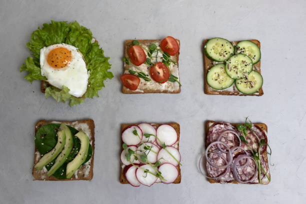 istock Sandwiches with different spreads, sandwich with eggs, cucumbers, tomatoes 1223230696