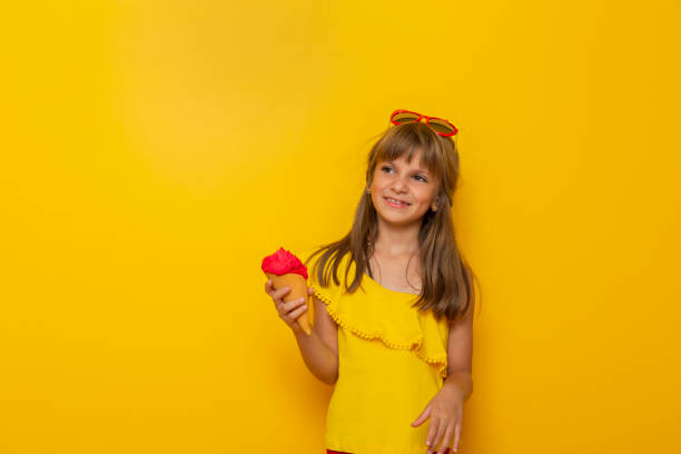 istock Child eating ice cream 1223231155