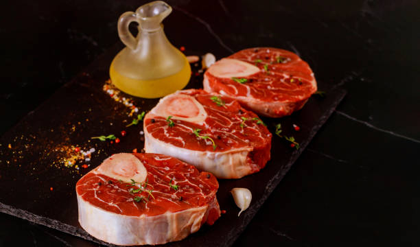 istock Cutted beef leg with spices and garlic. 1223234060