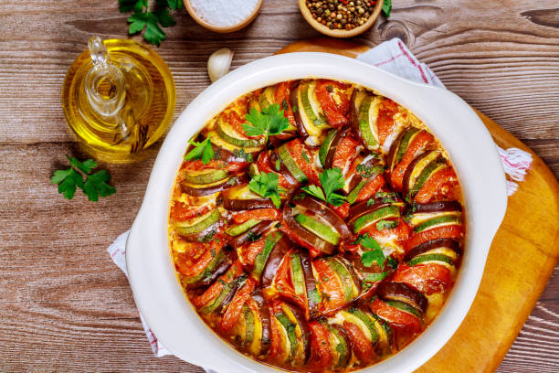 istock Baked vegetable with tomato sauce in white oven bowl. 1223234063