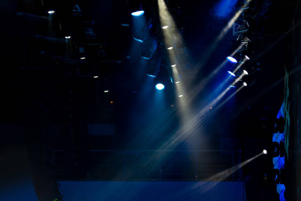 istock lights spotlights and smoke over the stage 1223235178
