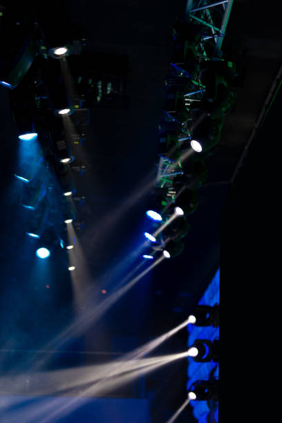istock lights spotlights and smoke over the stage 1223235201