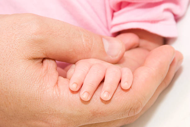 istock Baby, Father And Their Hand 122323523