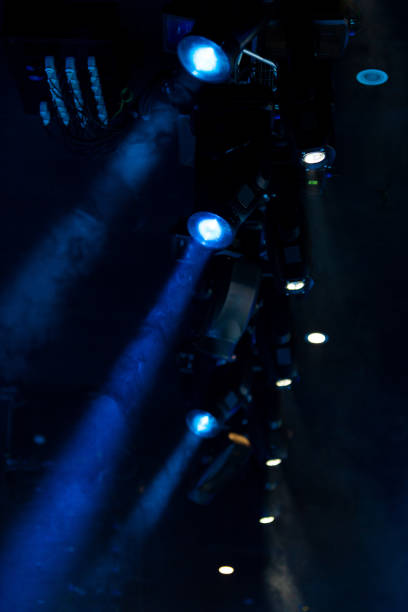 istock lights spotlights and smoke over the stage 1223235255