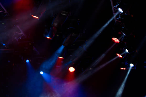 istock lights spotlights and smoke over the stage 1223235338