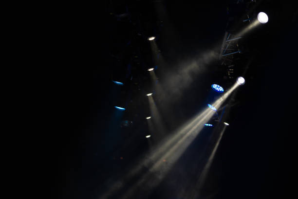 istock lights spotlights and smoke over the stage 1223235382