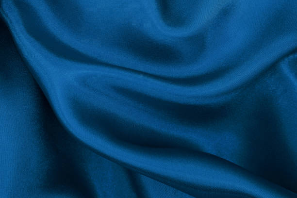 istock Dark blue fabric cloth texture for background and design art work, beautiful crumpled pattern of silk or linen. 1223236222